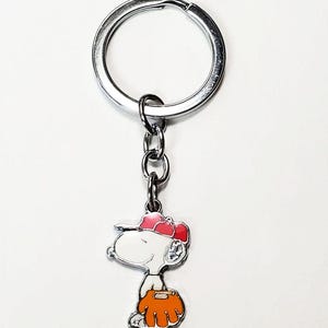 SNOOPY con dije de guante de béisbol, llavero con personaje de Peanuts, llavero, anillo o bolso, mochila, chaqueta, bolsa de gimnasio, billetera, etc., accesorio