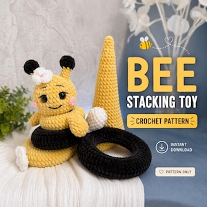 May include: A crocheted bee stacking toy with a yellow body, black stripes, and a white flower. The toy includes a black ring, a white ball, and a yellow cone. The text on the image says "BEE STACKING TOY CROCHET PATTERN".