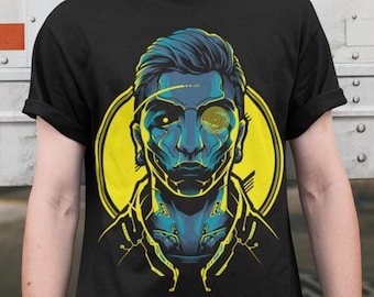May include: A black t-shirt with a graphic of a blue and green robot with a yellow eye. The robot is wearing a black jacket and has a yellow background.