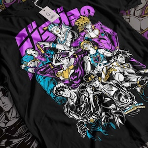 May include: Black t-shirt with a graphic print of multiple anime characters from the show JoJo's Bizarre Adventure. The characters are in various poses and have different colored outfits. The text "JoJo" is printed in purple on the shirt.