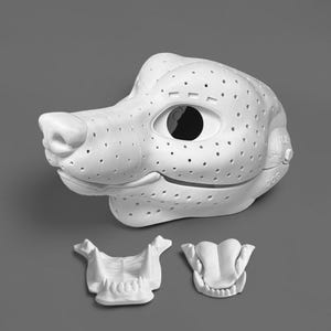 May include: A white 3D printed dog mask base featuring a perforated surface, large eye openings, and a snout. The set includes a separate white 3D printed jaw piece with teeth and a separate white 3D printed tongue piece with visible teeth details.