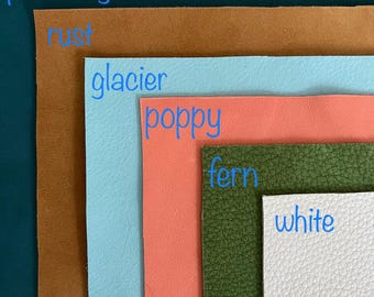May include: Six leather swatches in different colors and textures. The colors are phthalo green, rust, glacier, poppy, fern, and white. The text "soft 1.8-2.0 OZ" is at the top of the image.