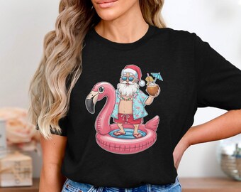 Funny Tropical Santa Christmas In July T-Shirt With Flamingo Float And Coconut Drink Summer Holiday Beach Vacation Graphic Tee