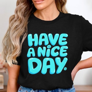 Camiseta "Tenha um bom dia", camiseta com estampa de vibrações positivas, camiseta com letras de sorriso fofo, camiseta retrô divertida e feliz, camiseta colorida com mensagem de gentileza