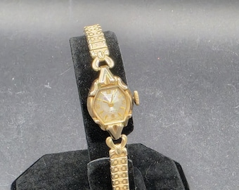 Vtg. 1960er Jahre Bulova 10K RGP Handaufzug Armbanduhr mit dehnbarem Armband.