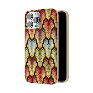 May include: A phone case with a colorful heart pattern. The case is made of a natural material and has a raised edge to protect the phone's screen.