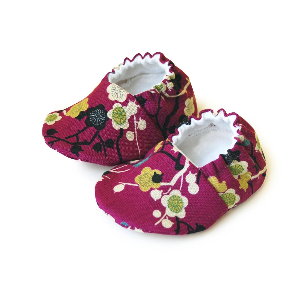 purple baby shoes
