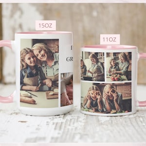 May include: Two white ceramic mugs with pink handles and rims. The larger mug is labeled "15oz" and the smaller mug is labeled "11oz". Each mug features a collage of photos. The mugs are likely personalized gifts.