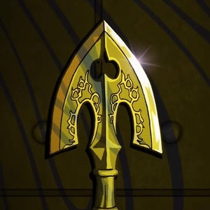 May include: A gold arrowhead with intricate details and a pointed tip. The arrowhead is set against a dark wood background.