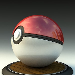 May include: A red and white Poke Ball with a black band and a button on the top. The Poke Ball is sitting on a wooden base.