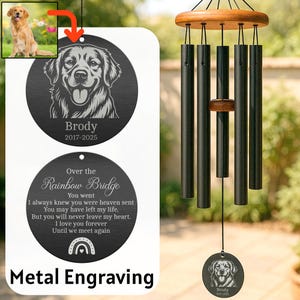 May include: A black metal wind chime with a personalized engraved plaque featuring a dog silhouette, the name "Brody", and the dates "2017-2025". The plaque also includes a poem about a pet crossing the rainbow bridge. The wind chime has a small, round, engraved tag with the dog's name and dates.