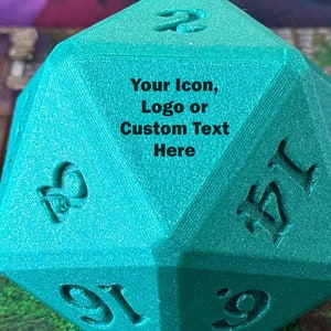 May include: A teal green 20-sided die with black numbers and the text "Your Icon, Logo or Custom Text Here" on one side.