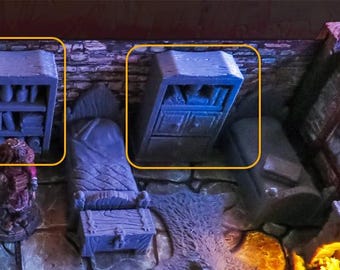 May include: Two miniature gray wooden cabinets with shelves and drawers. The cabinets are on a stone wall background.