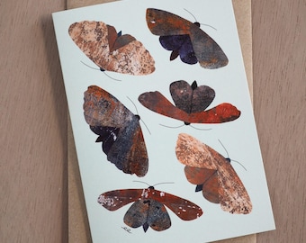 Moths 1 (blue) blank greeting card designed by Emily Engel from monoprint collage