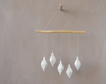 Macrocarpa gum blossom bud wall hanging. A white cast plaster botanical mobile hand made in Australia by Emily Engel