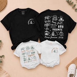May include: Two black t-shirts and two white baby bodysuits featuring camping graphics. The designs include a tent, campfire, binoculars, backpack, map, trees, mug, and compass with the text With love from YOSEMITE and Camp Jonson 2026.