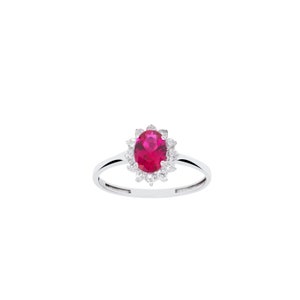 May include: A silver ring with a large oval-shaped red gemstone surrounded by smaller white gemstones.