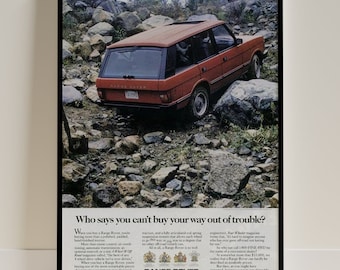 Puede incluir: Un Range Rover rojo conduciendo sobre un terreno rocoso. El pie de foto dice "¿Quién dice que no puedes comprar tu salida de los problemas?" El Range Rover es un vehículo de cuatro ruedas motrices con un motor potente y un interior lujoso.