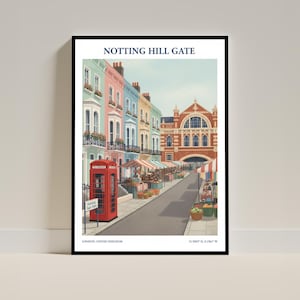 May include: A framed art print depicting Notting Hill Gate in London. The illustration features colorful row houses, a red telephone box, and a street market. The text "Notting Hill Gate" is at the top, with "London, United Kingdom" at the bottom.