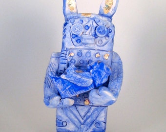 Maman robot bleue avec bébé