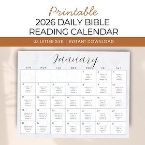 Op de afbeelding: Een afdrukbare 2026 Daily Bible Reading Calendar in US Letter formaat. De kalender heeft een witte achtergrond met een maandelijkse januari-weergave, met datums en bijbelverwijzingen. De titel "Printable" is in een scriptlettertype.