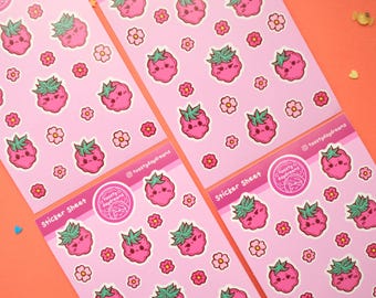 May include: Four pink sticker sheets with a repeating pattern of cartoon strawberries and pink flowers. Each sheet has the text "Sticker Sheet" and "Toasty Daydreams" in a circle with a cartoon girl inside.