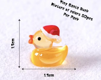 Glow in the dark Christmas miniature ducks for creative displays fun for family creative crafts for xmas fun ducks in Santa hat festivity!