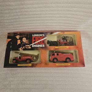 May include: A boxed set of four miniature London Fire Engines. The set includes a 1900 Shand Mason Pump, a 1934 Dennis Pump Escape, and a 1953 Dennis F8 Major Pump. The box features the words "London's Fire Engines".