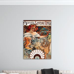 May include: A vintage poster featuring a woman with red hair holding a plate of biscuits. The poster has the text "Biscuits Lefèvre Utile" and "1895" in ornate lettering. The artwork is in the Art Nouveau style, with a decorative border and a color palette of gold, blue, and brown.