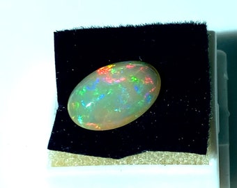 Ethiopian Welo Hydrophane opal cabachon 13.5 x 9 mm oval 2.85 carats