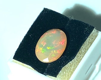 Ethiopian Welo crystal opal faceted 13 x 9.75 mm oval 3.25 carats