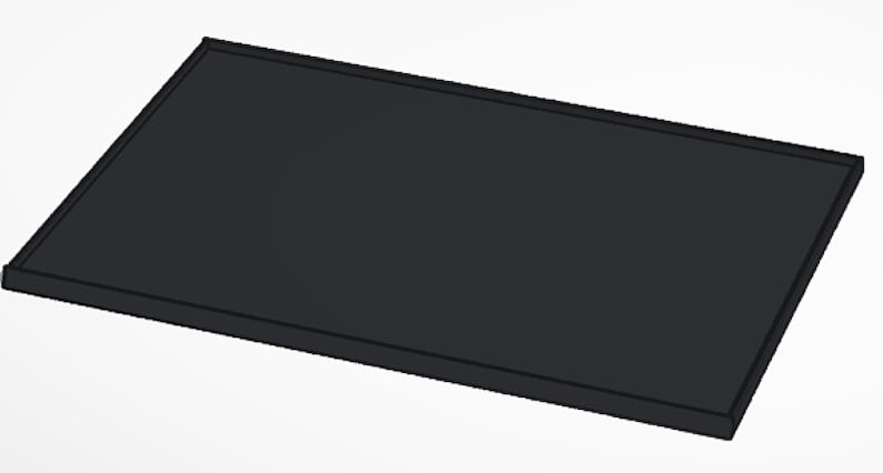 May include: A black rectangular tray with a raised edge.