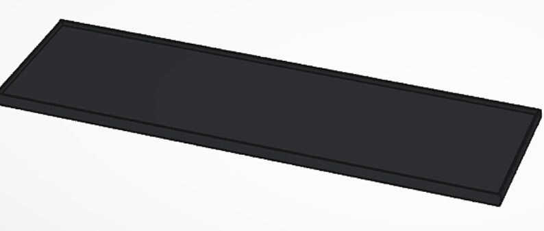 May include: A black rectangular tray with a slightly raised edge.