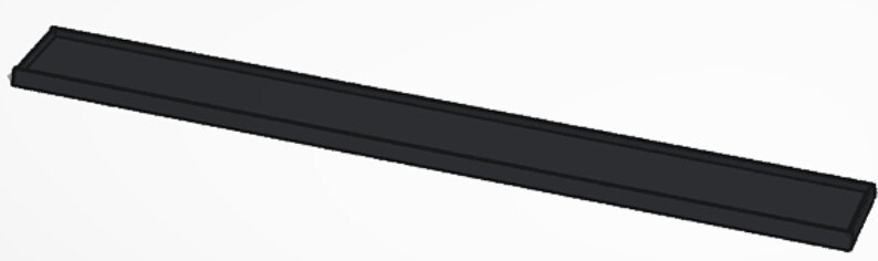 May include: A long, black, rectangular magnetic strip.