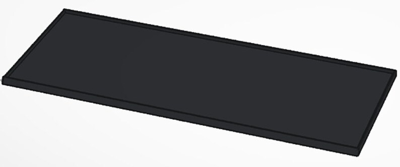 May include: A black rectangular tray with a smooth surface.