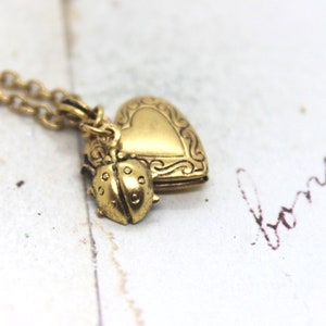 ladybug. locket necklace. in gold ox small size heart