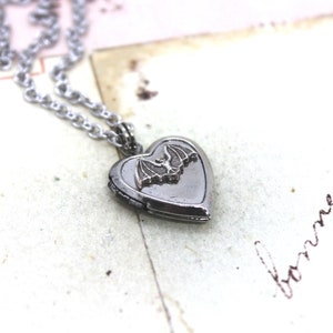 bat. locket necklace. in antiqued shiny silver tone inset heart image 1