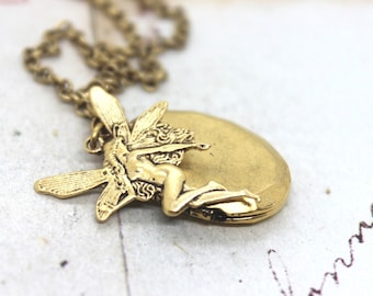 fairy. locket necklace. in gold ox jewelry