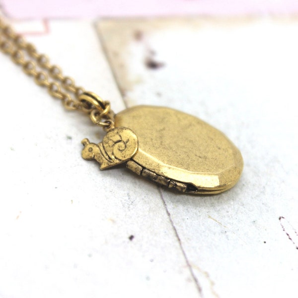 snail. locket necklace. gold ox jewelry