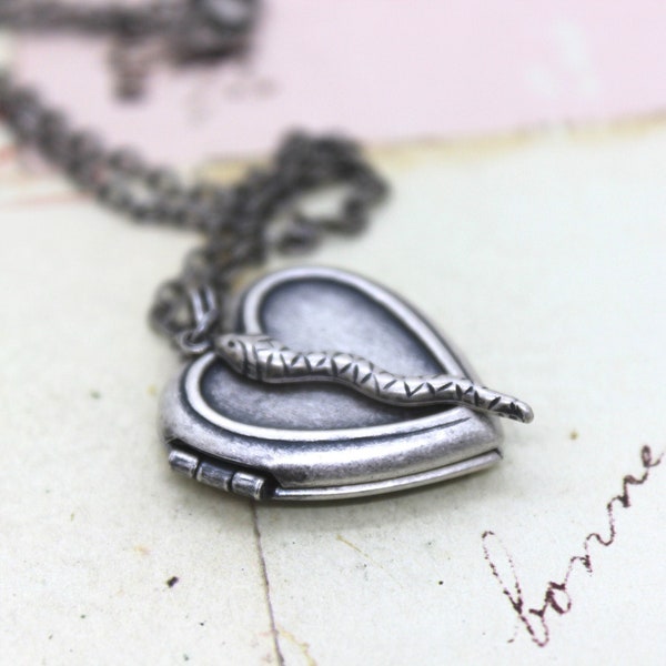 snake. heart locket necklace in silver ox