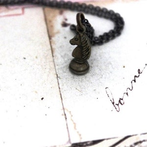 chess piece necklace. antiqued brass tone