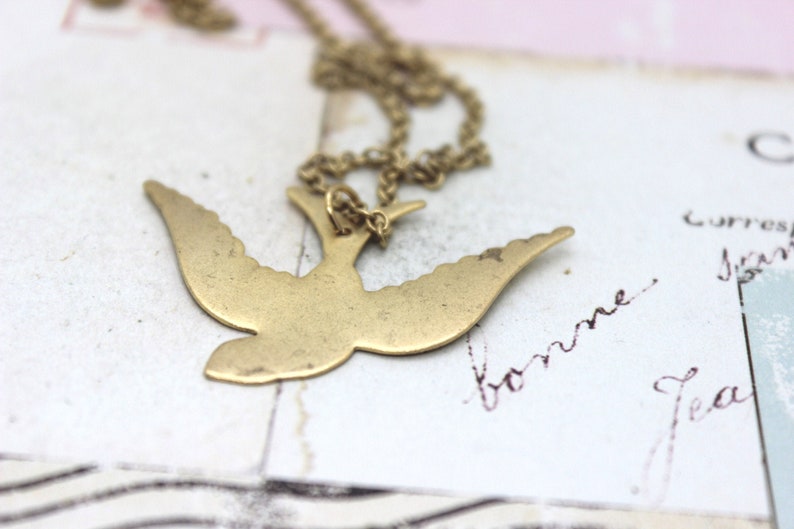 necklace in gold ox jewelry swallow bird