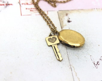 key heart locket necklace. gold ox jewelry oval locket