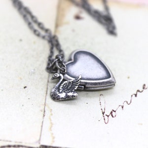 swan. heart locket necklace. silver ox jewelry