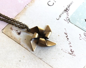 pinwheel. necklace. brass ox jewelry