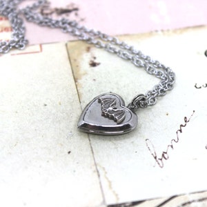 bat. locket necklace. in antiqued shiny silver tone inset heart image 2