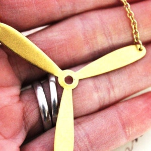 propeller. necklace. gold ox jewelry image 4