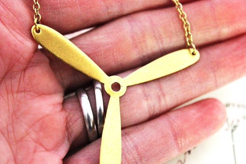 propeller. necklace. gold ox jewelry image 4