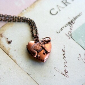 elephant. heart locket necklace. copper ox