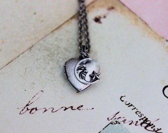 moon and star. heart locket necklace. in silver ox